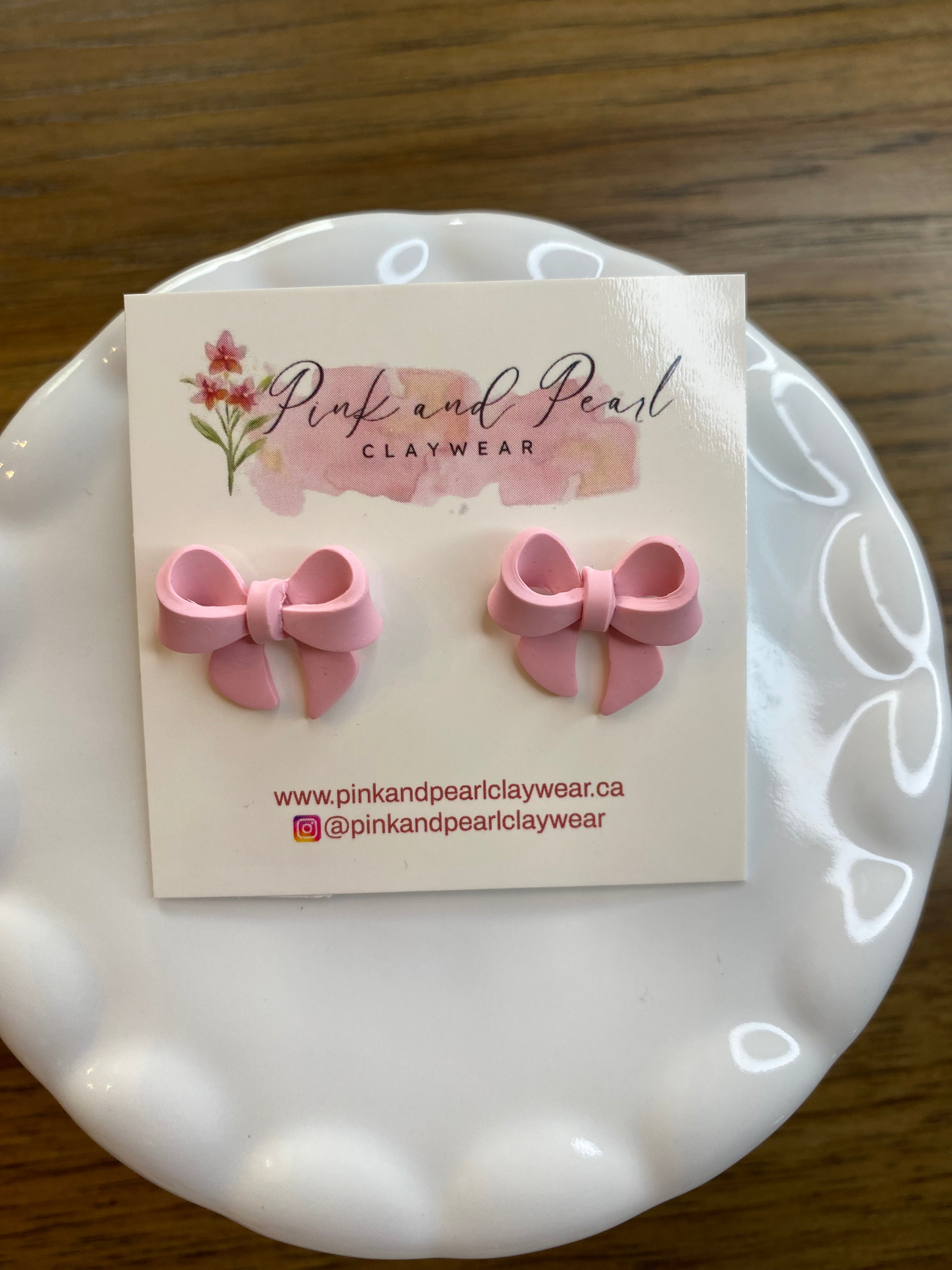 Pink bow stud