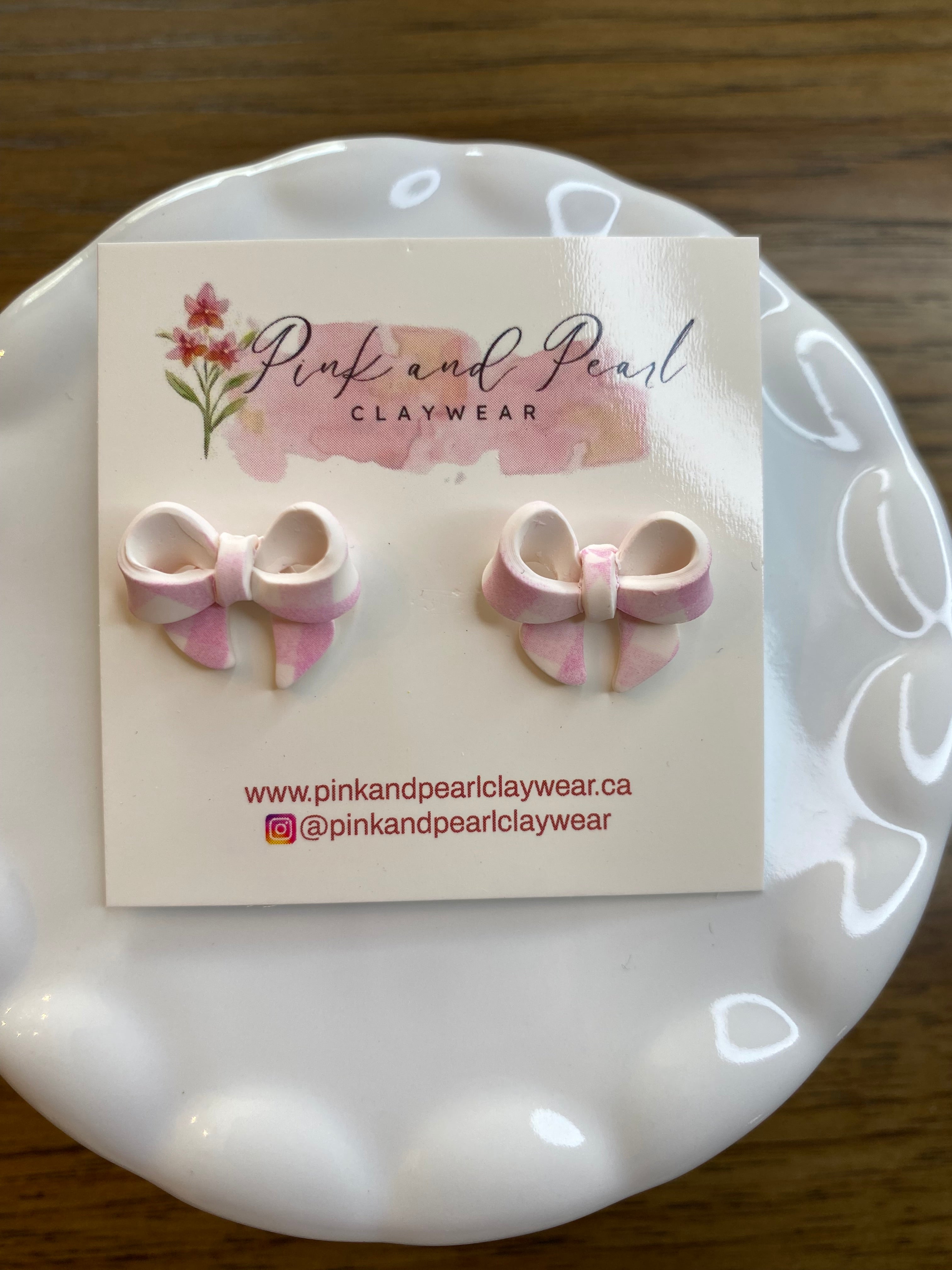 Pink gingham bow studs