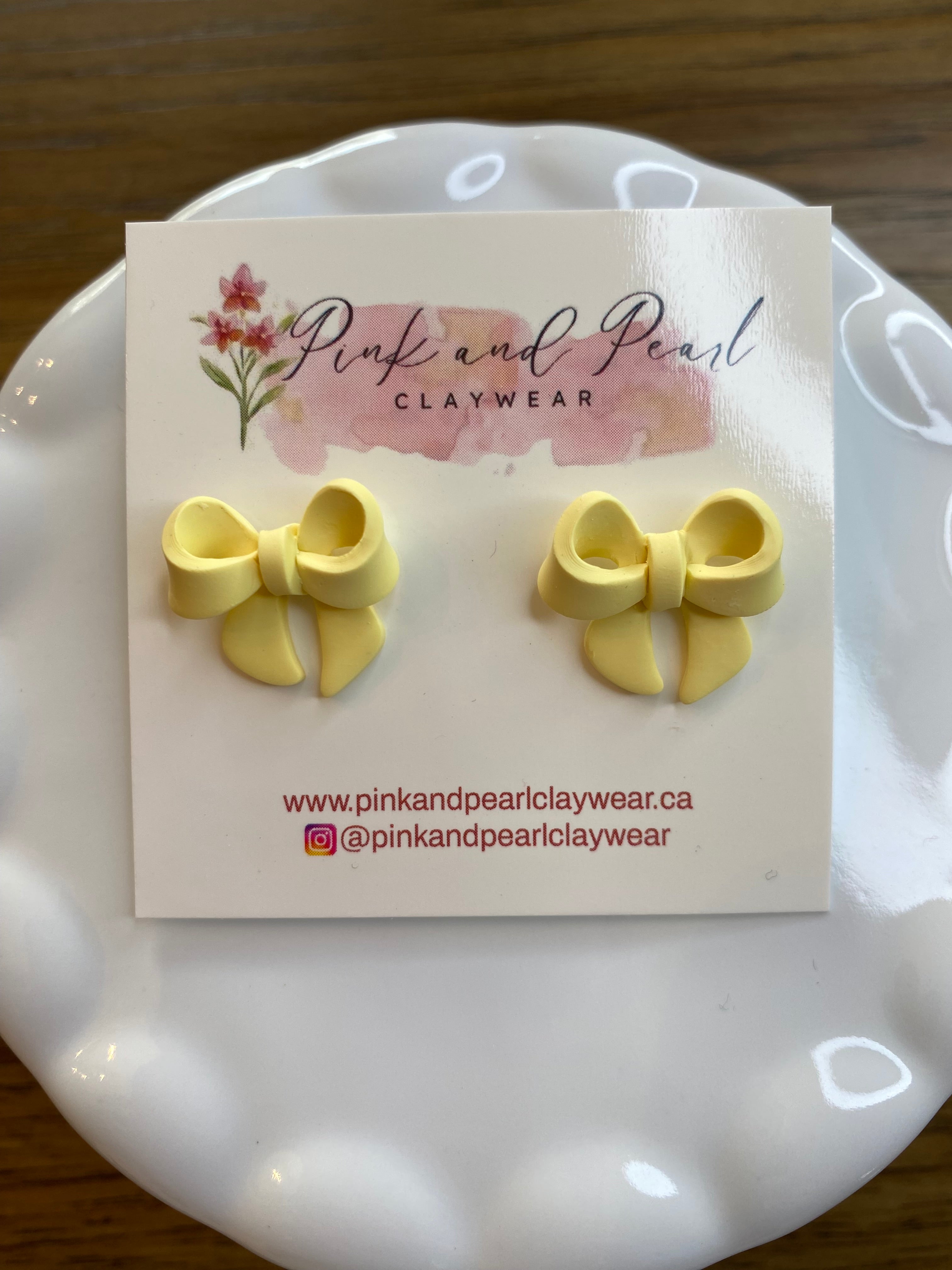 Yellow bow studs